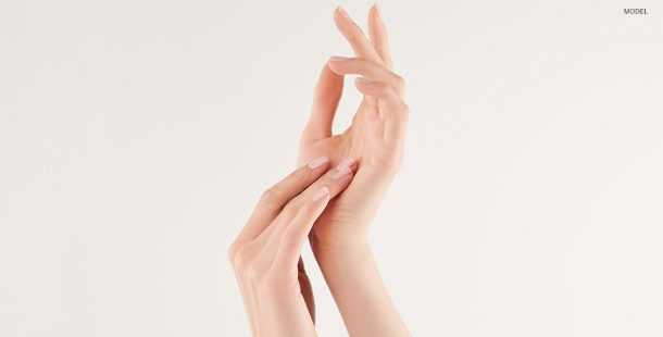 Close Up of Hands Touching Each Other