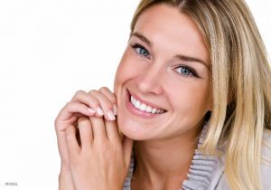 Smiling Young Blonde Caucasian Women with Narrow Nose